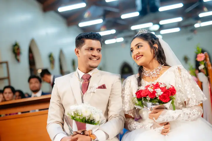 Anosh and Nikita: A smile across the aisle.
