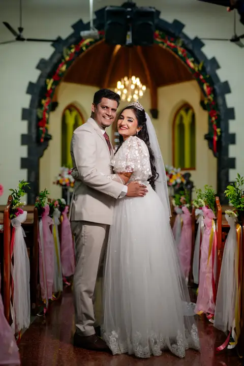 Anosh and Nikita: Beneath the church arch.