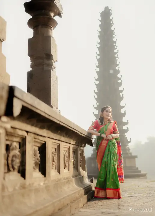 Ashish and Nivedita: Framed by stone pillars.