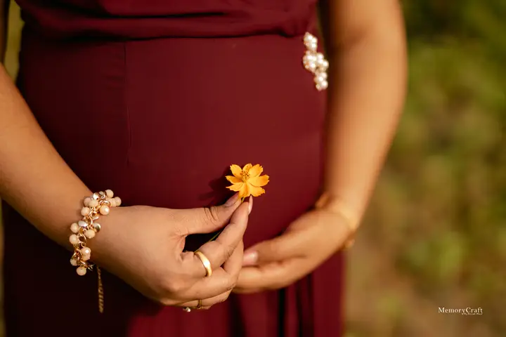 Kimaya and Ajinkya: A flower for the little one.