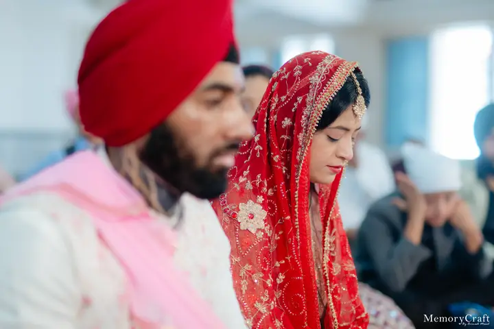 Kulwinder and Manoj: A quiet moment in the vows.