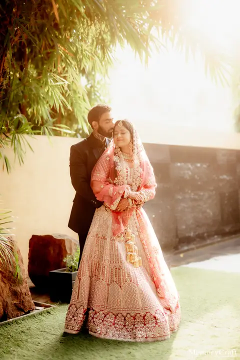 Kulwinder and Manoj: Together in golden light.