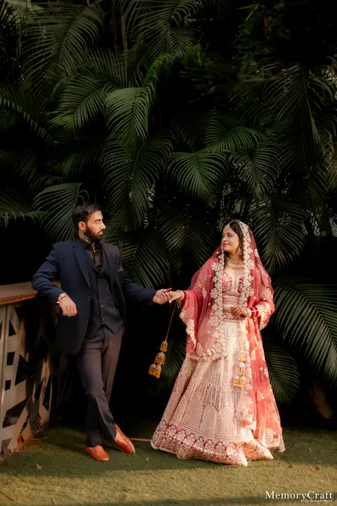 Kulwinder and Manoj: A walk beneath the leaves.