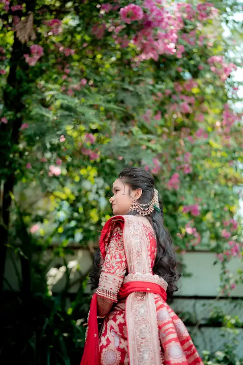 Madhuri and Ashish: Beneath the bougainvillea.