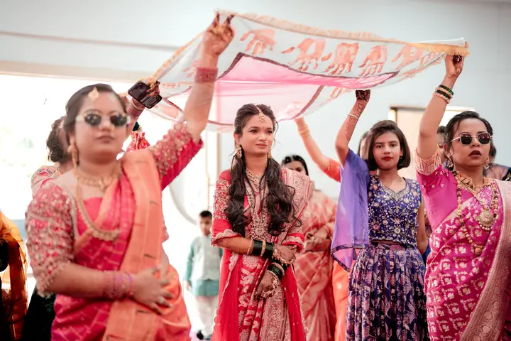 Madhuri and Ashish: Surrounded by her people.