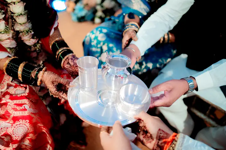 Madhuri and Ashish: Hands joining in the rituals.