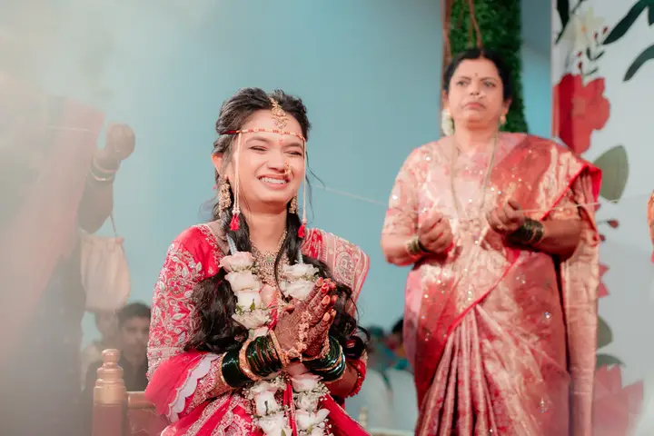 Madhuri and Ashish: A smile through the rituals.