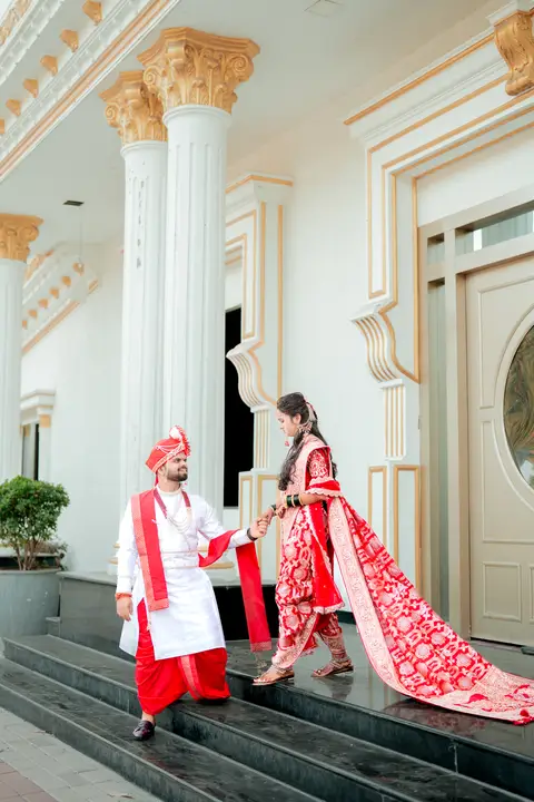 Madhuri and Ashish: A portrait on the steps.