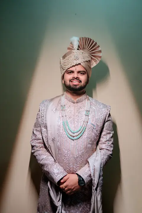 Madhuri and Ashish: An evening portrait of the groom.