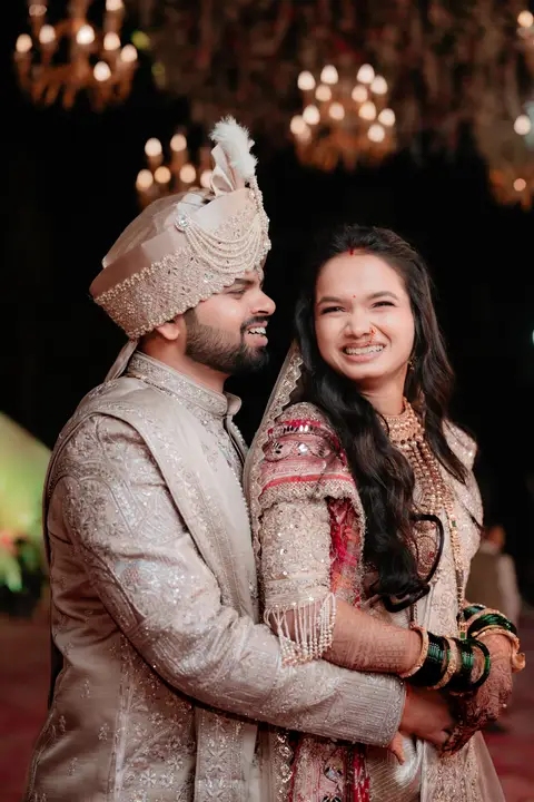 Madhuri and Ashish: Together under the chandeliers.