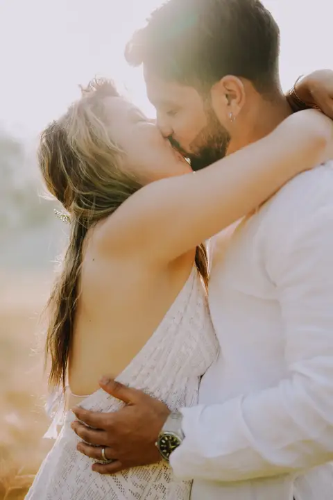 Pratik and Andra: A kiss in the sunlight.