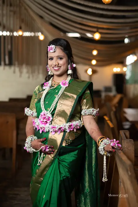 Rushikesh and Sneha: Sneha in green and gold.