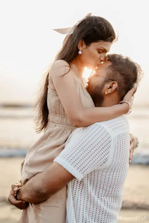 Sanket and Swapnali: Lifted into the air.
