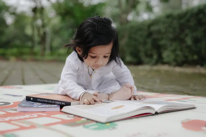 Shravan: Reading a book.