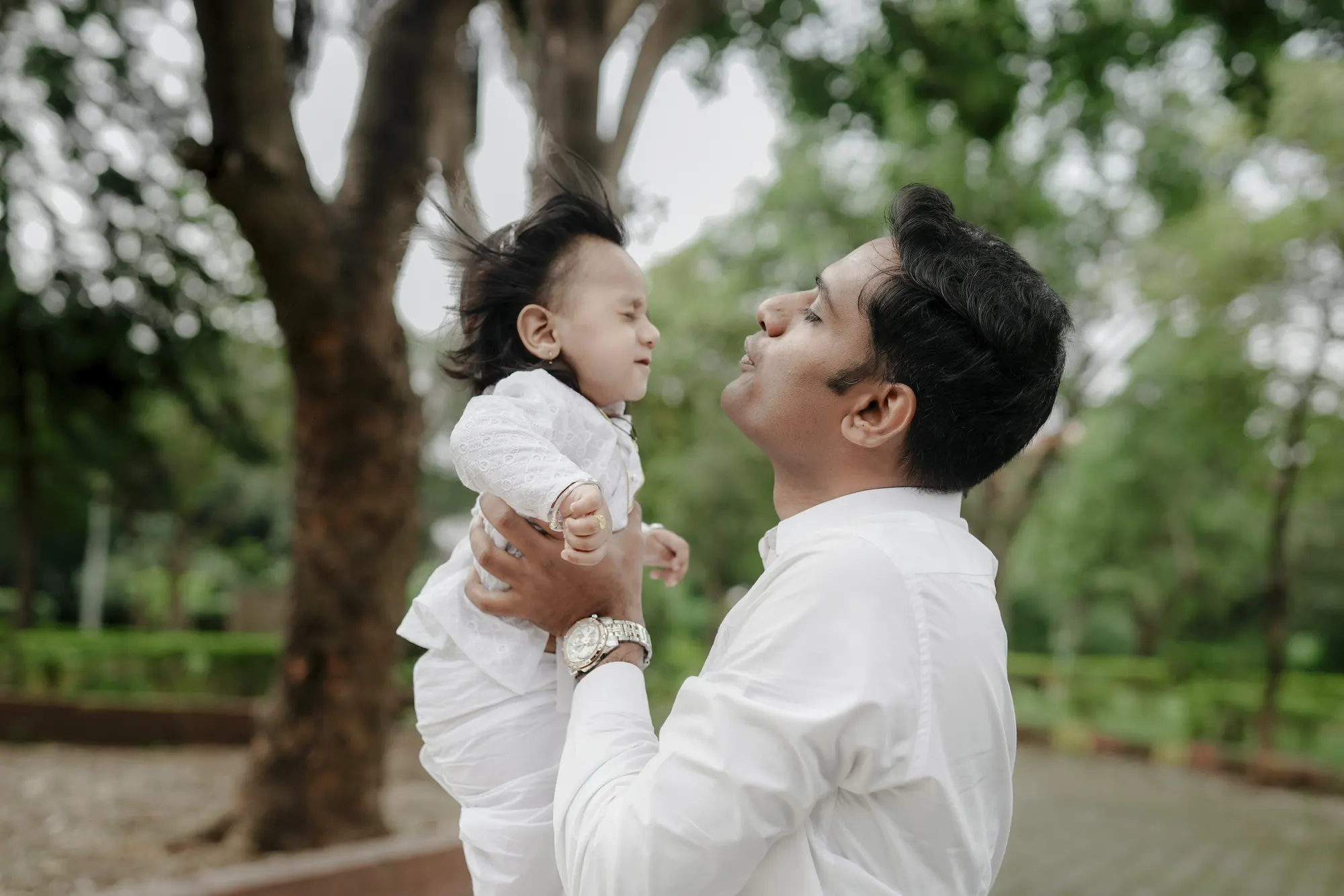 Shravan: Laughter in dad’s arms.