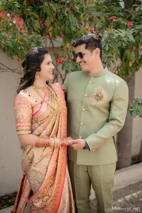 Siddhi and Kunal: A glance beneath the flowers.