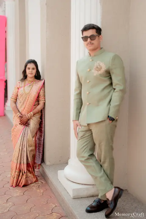 Siddhi and Kunal: A portrait among the columns.