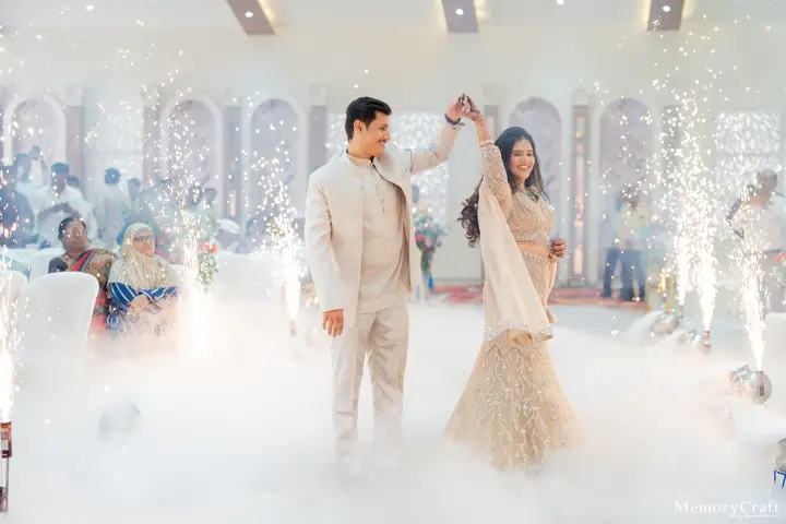 Siddhi and Kunal: A twirl beneath the lights.