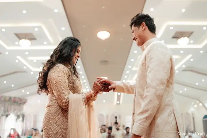 Siddhi and Kunal: The ring exchange.