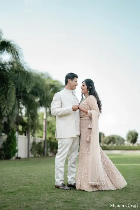 Siddhi and Kunal: Together beneath the palms.