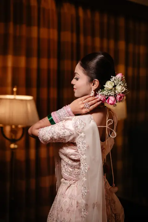 Sumit and Pragati: Flowers in her hair.