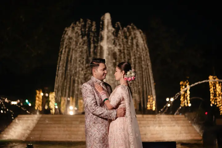 Sumit and Pragati: Together by the fountain.