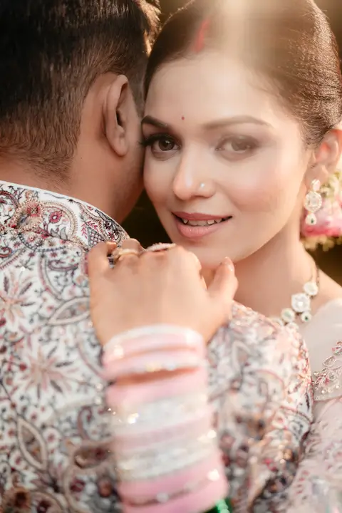 Sumit and Pragati: A smile over his shoulder.