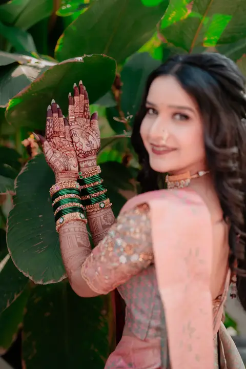Swaraj and Anuja: Henna and a smile.