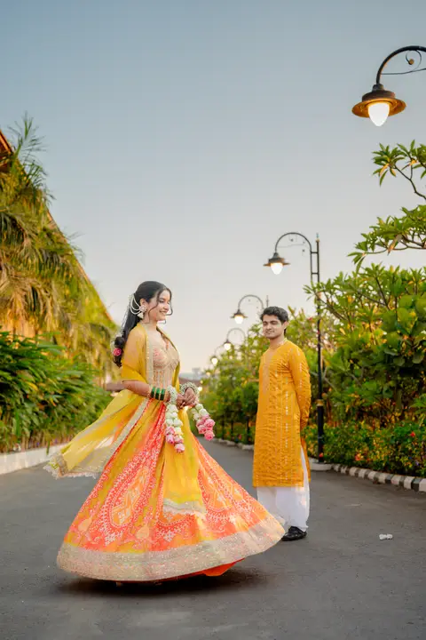 Swaraj and Anuja: A twirl in yellow.
