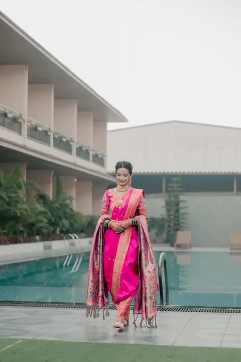 Swaraj and Anuja: A portrait by the water.