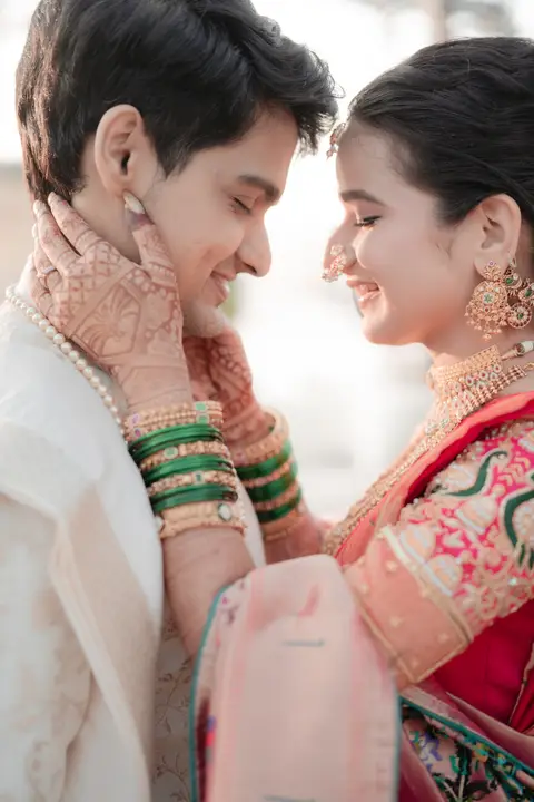 Swaraj and Anuja: A smile between two people.
