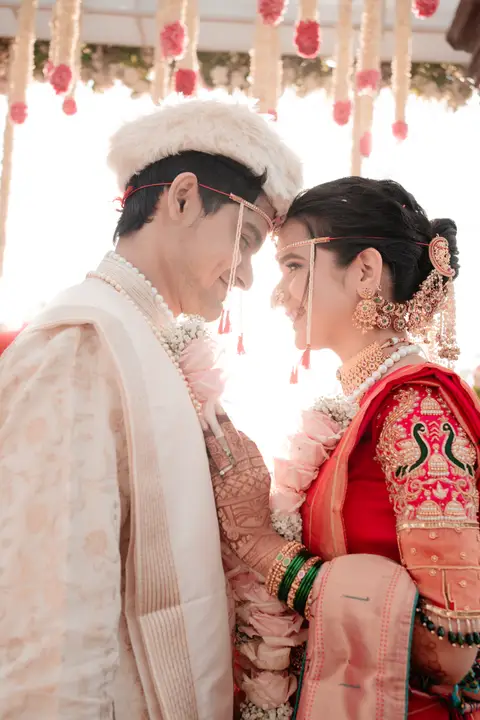 Swaraj and Anuja: Together beneath the flowers.