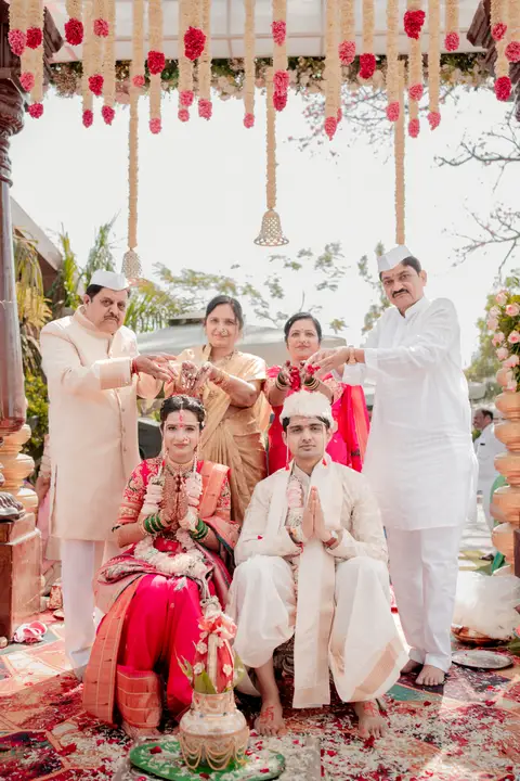 Swaraj and Anuja: Family together.