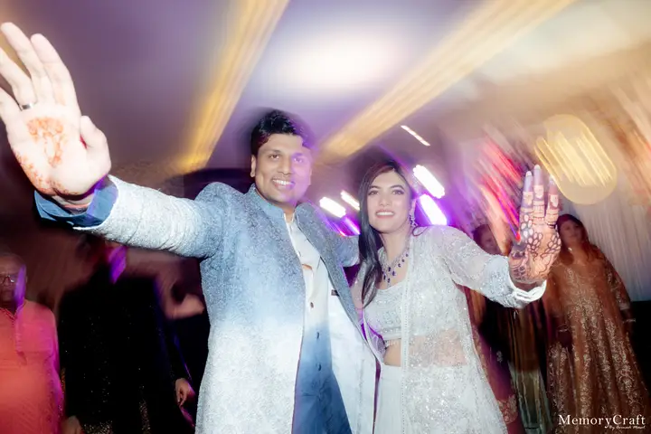 Vini and Mayank: Hands up on the dance floor.